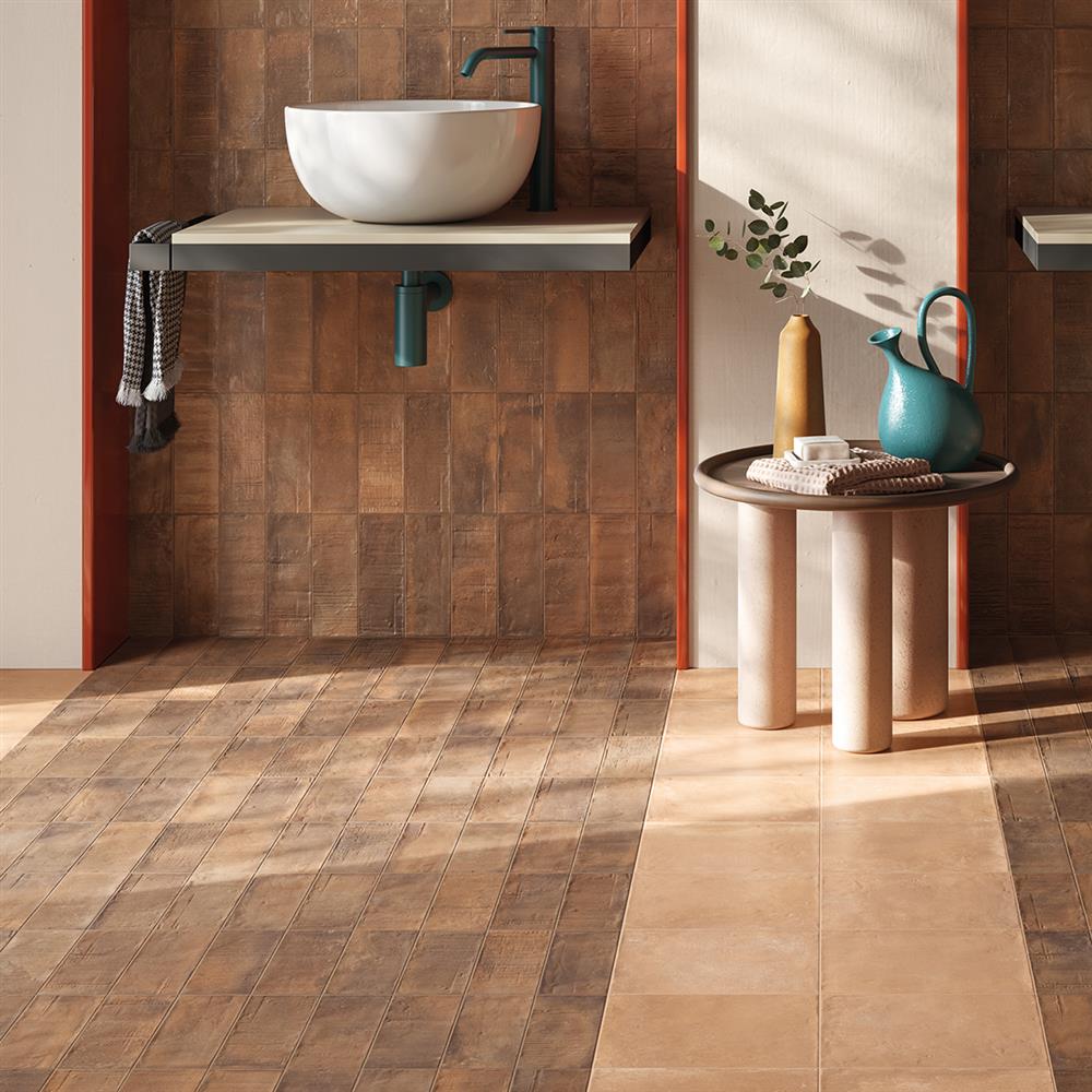 A combination of tonal terracotta tiles for a bathroom wall and floor